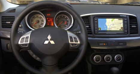 Поездить за рулем Лансера Виталия Челнокова